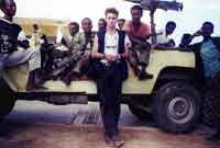 Dan Eldon in front of Truck with Friends.